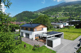 Einfamilienhaus mit PV-Anlage und Wärmepumpe zum Heizen und Kühlen