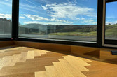 Ausblick aus dem Wohnbereich mit Fußboden und Fußbodenheizung